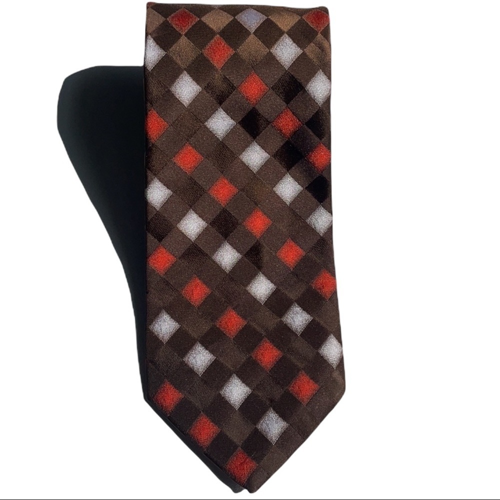 Vintage Wimbley tie that’s made to match Brown, Olive or Black suits.